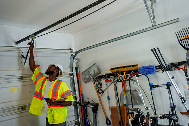 Professional Garage Door Roller Replacement technician working in Rogers City, MI